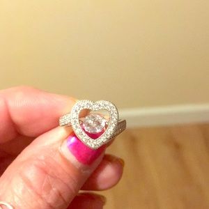 Woman’s sterling silver beautiful heart ring.
